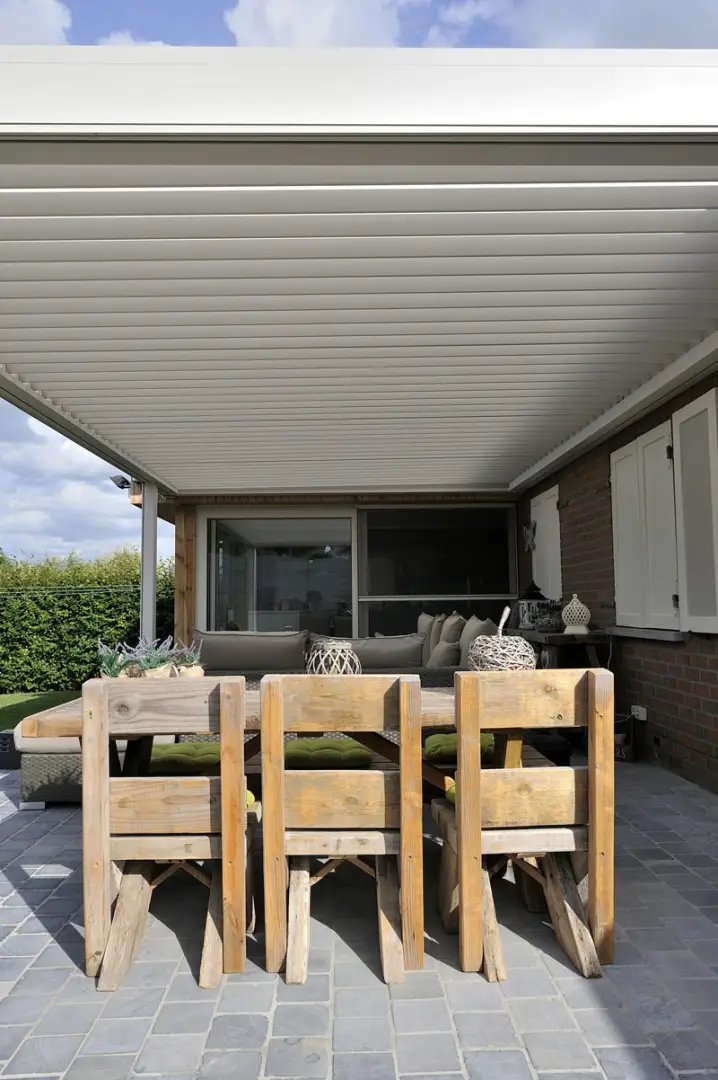 1500 Series Outdoor Shelter above a patio behind a home