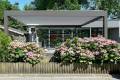 1500 Series Outdoor Shelter behind a home