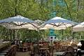 P6 Square Quattro Umbrellas at an outdoor dining area in Bryant Park