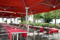 P6 Square Quattro Umbrellas at an outdoor dining area