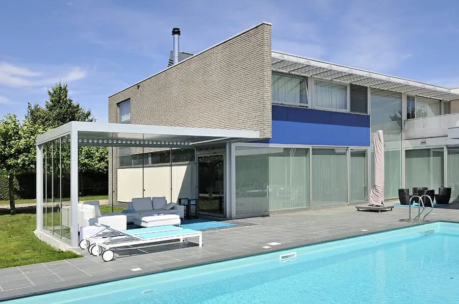 2000 Series Outdoor Shelter covering a seating area next to a pool