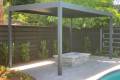 1500 Series Outdoor Shelter covering an outdoor fire pit