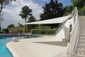 Velart Sail Shade next to a pool