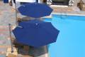 blue commercial cantilevered pool umbrellas