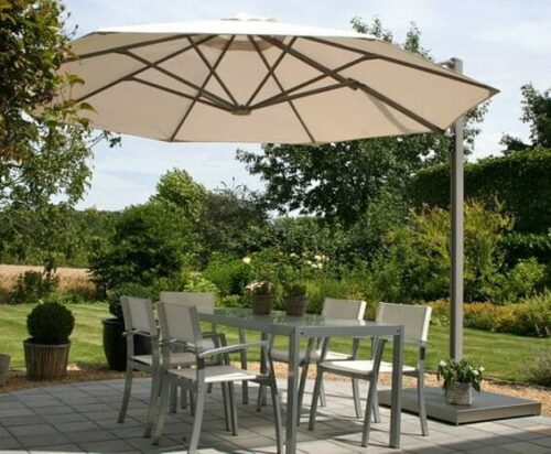 P6 Round Cantilever Umbrella over an outdoor seating area