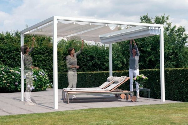 a woman opening her Retractable Roof Poolside Cabana