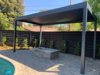 1500 Series Outdoor Shelter covering an outdoor fire pit
