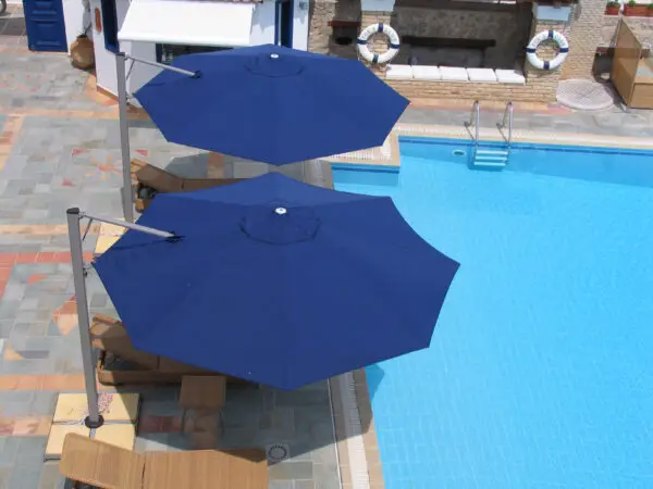 blue commercial cantilevered pool umbrellas